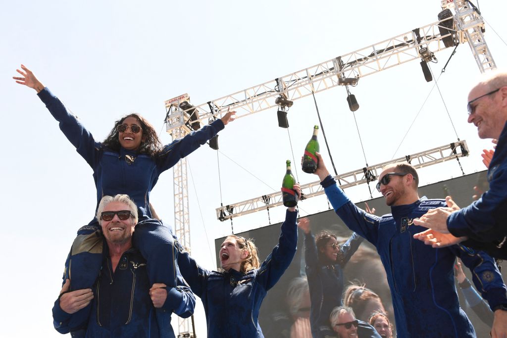 Spaceplane Success: Virgin Galactic Crew’s Knuckle Lock Celebrates Historic Launch