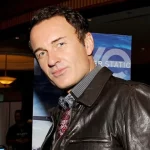 Julian McMahon, The Iconic Face of Doctor Doom and Christian Troy, Passes Away at 56 – A Painful Goodbye to a TV Legend